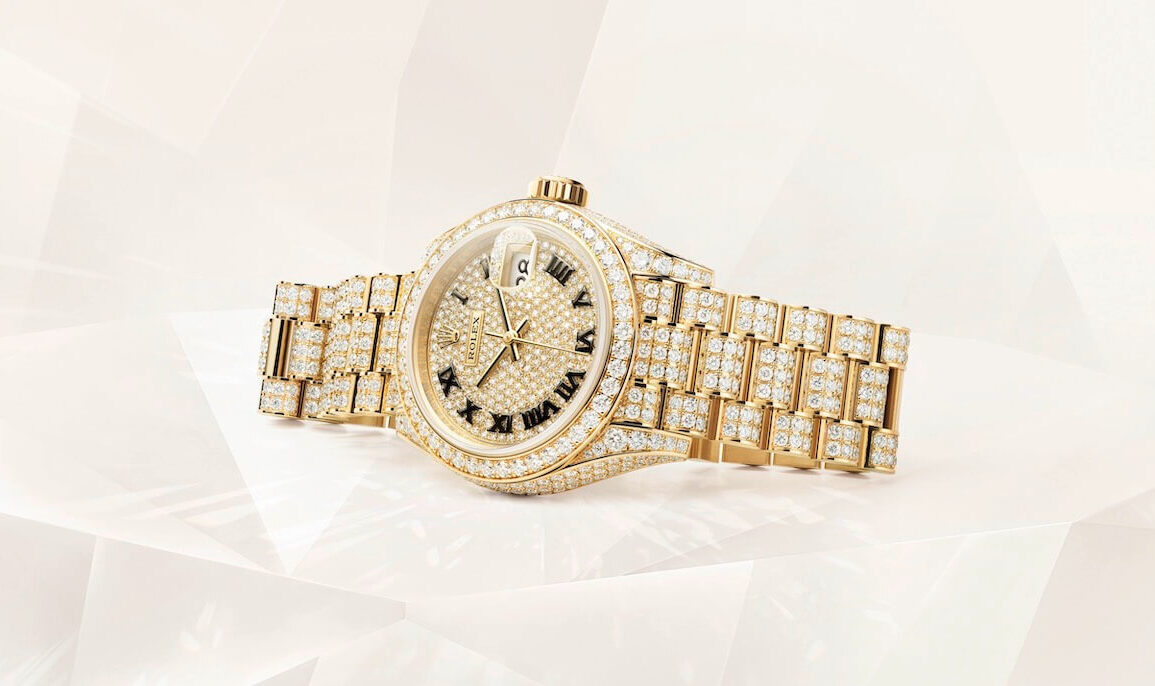 Oyster Perpetual Lady Datejust in 18 ct yellow gold with a diamond paved dial and a diamond set President bracelet 1