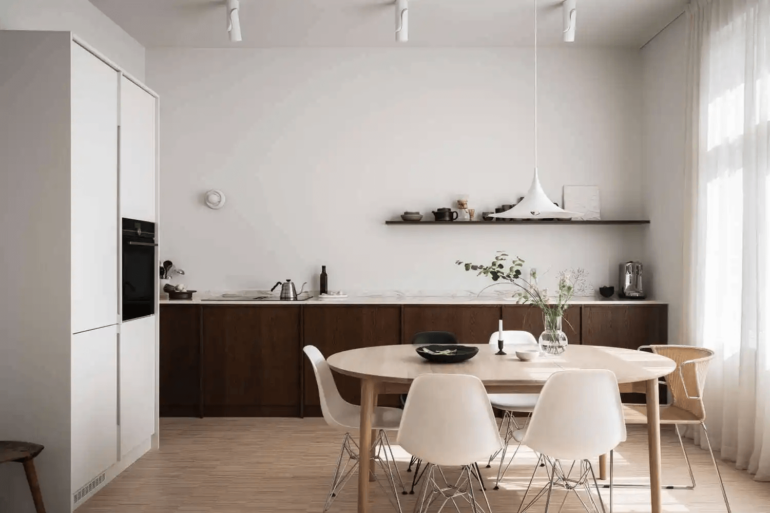 Norwegian home with white walls and a dark wood kitchen1